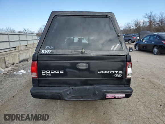 2004 Dodge Dakota z VIN 1D7FL16K54S682499, wystawiony jako Copart lot #42116895 z przebiegiem Nie podano mil oraz Nie do naprawy • Non repairable. Historia ofert i sprzedaży dostępna na DreamBid. Obrazek 6.