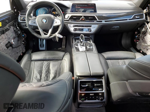 2019 BMW 7 Series 750i xDrive с VIN WBA7F2C57KB240408, выставлен на аукционе Copart как лот 75825244 с пробегом 125 702 миль миль и Списание • Salvage title. История ставок и продаж доступна на DreamBid. Изображение 8.