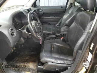 2014 Jeep Patriot High Altitude z VIN 1C4NJPFA4ED813336, wystawiony jako Copart lot #54747055 z przebiegiem 144 000 mil mil oraz Szkoda całkowita • Salvage title. Historia ofert i sprzedaży dostępna na DreamBid. Obrazek 7.