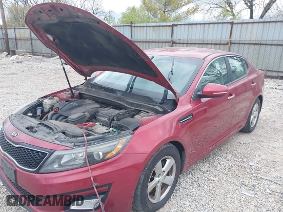 2015 Kia Optima LX with VIN 5XXGM4A7XFG446248, listed as a IAAI auction lot 42047807 with 167,000 mi miles. Bid and sale history available at carsss.com. Image 6.