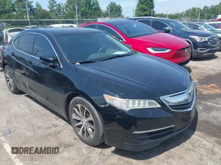 2015 Acura TLX z VIN 19UUB1F34FA006990, wystawiony jako IAAI lot #42546445 z przebiegiem 74 227 mil mil oraz . Historia ofert i sprzedaży dostępna na DreamBid. Obrazek 1.
