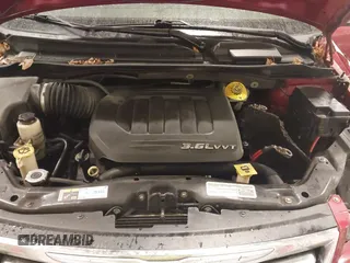 2015 Chrysler Town & Country Touring L with VIN 2C4RC1CG8FR525304, listed as a IAAI auction lot 41829438 with 125,587 mi miles and . Bid and sale history available at DreamBid. Image 10.