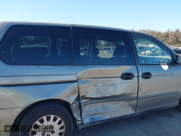 2002 Honda Odyssey LX z VIN 2HKRL18542H553437, wystawiony jako IAAI lot #41824481 z przebiegiem 222 428 mil mil oraz . Historia ofert i sprzedaży dostępna na DreamBid. Obrazek 6.