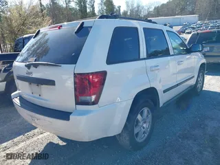 2009 Jeep Grand Cherokee Laredo with VIN 1J8GS48K89C508808, listed as a IAAI auction lot 41821130 with 266,712 mi miles. Bid and sale history available at carsss.com. Image 4.