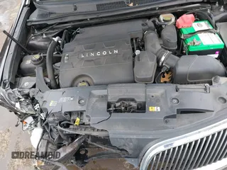 2014 Lincoln MKS with VIN 1LNHL9EK7EG609329, listed as a IAAI auction lot 41555819 with 89,849 mi miles. Bid and sale history available at carsss.com. Image 10.