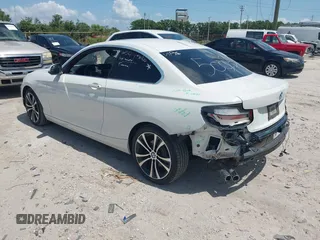 2020 BMW 2 Series 230i with VIN WBA2J1C05L7E54523, listed as a IAAI auction lot 42013928 with 43,659 mi miles. Bid and sale history available at carsss.com. Image 3.