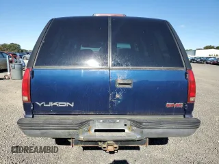 1999 GMC Yukon with VIN 1GKEK13R3XJ757466, listed as a Copart auction lot 75750884 with 270,768 mi miles and Salvage Title. Bid and sale history available at carsss.com. Image 6.