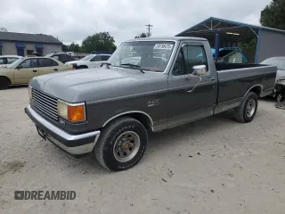1990 Ford F-150 z VIN 1FTDF15N7LNB38801, wystawiony jako Copart lot #59738475 z przebiegiem 273 718 mil mil oraz Czysty tytuł • Clean title. Historia ofert i sprzedaży dostępna na DreamBid. Obrazek 1.