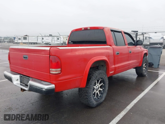 2001 Dodge Dakota Sport z VIN 1B7GG2AN91S110843, wystawiony jako IAAI lot #42316636 z przebiegiem 263 073 mil mil oraz . Historia ofert i sprzedaży dostępna na DreamBid. Obrazek 4.