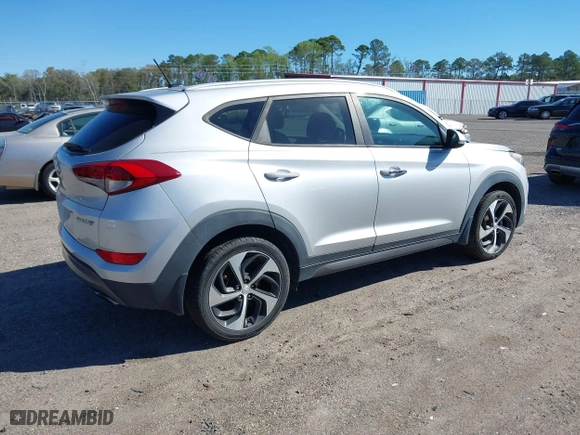2016 Hyundai Tucson Sport with VIN KM8J33A25GU224084, listed as a IAAI auction lot 41827851 with 153,348 mi miles. Bid and sale history available at carsss.com. Image 4.