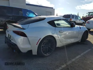 2020 Toyota Supra 3.0 z VIN WZ1DB4C06LW028984, wystawiony jako Copart lot #82659403 z przebiegiem 38 776 mil mil oraz . Historia ofert i sprzedaży dostępna na DreamBid. Obrazek 3.