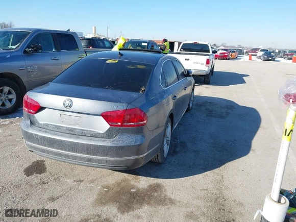 2013 Volkswagen Passat TDI SE w/Sunroof with VIN 1VWBN7A35DC136332, listed as a IAAI auction lot 41639915 with 119,310 mi miles. Bid and sale history available at carsss.com. Image 4.