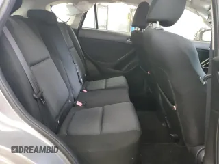 2013 Mazda CX-5 Sport with VIN JM3KE2BE6D0110272, listed as a Copart auction lot 57570725 with 124,475 mi miles and Salvage title. Bid and sale history available at DreamBid. Image 11.