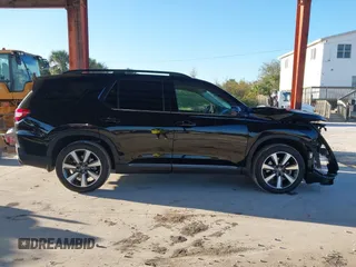 2024 Honda Pilot Elite with VIN 5FNYG1H85RB001707, listed as a IAAI auction lot 41793733 with 20,491 mi miles. Bid and sale history available at carsss.com. Image 14.