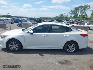 2016 Kia Optima LX with VIN KNAGT4L3XG5095972, listed as a IAAI auction lot 42130422 with 103,420 mi miles. Bid and sale history available at carsss.com. Image 14.