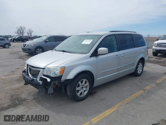2012 Chrysler Town & Country Touring with VIN 2C4RC1BG5CR157712, listed as a IAAI auction lot 41942939 with 244,799 mi miles. Bid and sale history available at carsss.com. Image 2.