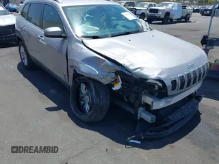 2019 Jeep Cherokee Latitude with VIN 1C4PJLCB8KD241701, listed as a IAAI auction lot 42407536 with 59,006 mi miles and . Bid and sale history available at DreamBid. Image 1.