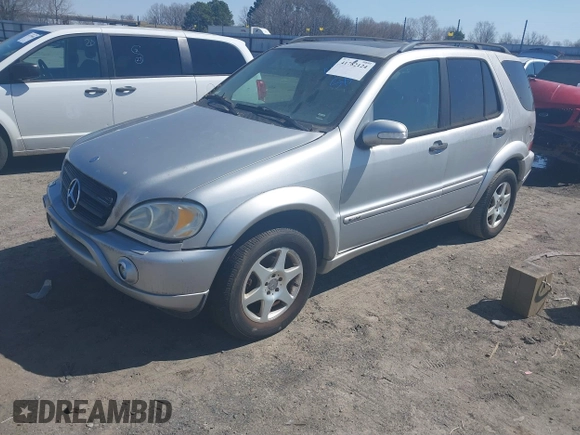 2003 Mercedes-Benz M-Class 3.2L with VIN 4JGAB54E23A383144, listed as a IAAI auction lot 41782124 with 148,084 mi miles. Bid and sale history available at carsss.com. Image 2.