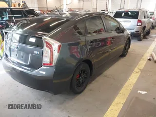 2015 Toyota Prius Four with VIN JTDKN3DU8F1983215, listed as a IAAI auction lot 41809447 with 135,899 mi miles. Bid and sale history available at carsss.com. Image 4.