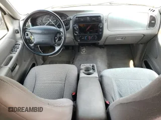 2001 Ford Explorer XLS with VIN 1FMZU72E11ZA76025, listed as a Copart auction lot 61963445 with 266,687 mi miles and Salvage title. Bid and sale history available at DreamBid. Image 8.