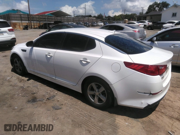 2015 Kia Optima LX with VIN KNAGM4A70F5645049, listed as a IAAI auction lot 42758383 with 214,934 mi miles and . Bid and sale history available at DreamBid. Image 3.