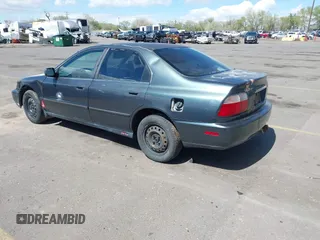 1997 Honda Accord LX with VIN JHMCD5639VC020185, listed as a IAAI auction lot 42072191 with 263,967 mi miles and . Bid and sale history available at carsss.com. Image 3.