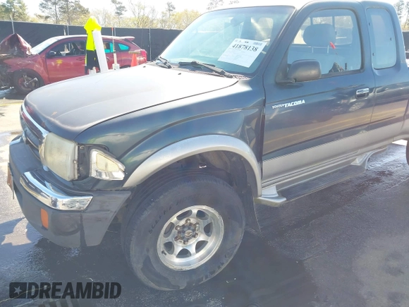 1998 Toyota Tacoma with VIN 4TAWN72N5WZ120258, listed as a IAAI auction lot 41878138 with 268,640 mi miles and . Bid and sale history available at DreamBid. Image 6.