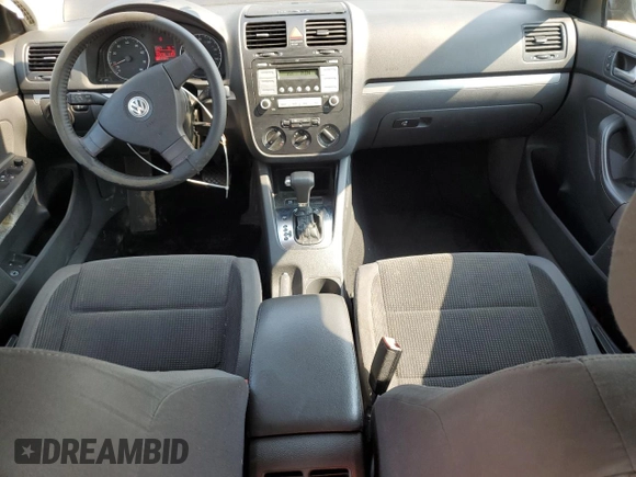 2009 Volkswagen Jetta S with VIN 3VWJM71K69M154382, listed as a Copart auction lot 60513215 with 193,278 mi miles and Salvage title. Bid and sale history available at DreamBid. Image 8.