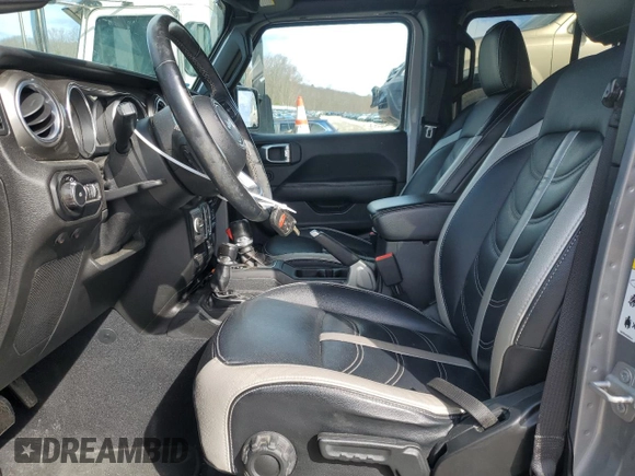 2018 Jeep Wrangler Unlimited Sahara z VIN 1C4HJXEG4JW285606, wystawiony jako Copart lot #49254405 z przebiegiem 57 148 mil mil oraz Szkoda całkowita • Salvage title. Historia ofert i sprzedaży dostępna na DreamBid. Obrazek 7.
