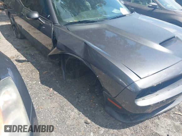2019 Dodge Challenger R/T z VIN 2C3CDZBT1KH571481, wystawiony jako IAAI lot #39615755 z przebiegiem 90 073 mil mil oraz . Historia ofert i sprzedaży dostępna na DreamBid. Obrazek 6.