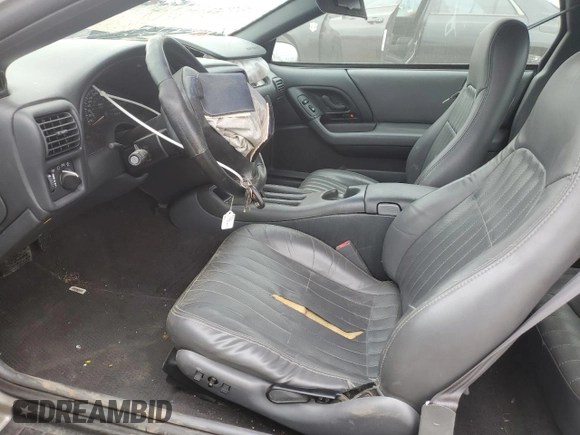 1999 Chevrolet Camaro Z28 z VIN 2G1FP22G2X2136787, wystawiony jako Copart lot #76599644 z przebiegiem 47 740 mil mil oraz Szkoda całkowita • Salvage title. Historia ofert i sprzedaży dostępna na DreamBid. Obrazek 7.