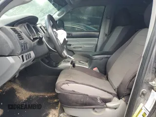 2014 Toyota Tacoma with VIN 5TFMU4FN3EX025697, listed as a Copart auction lot 62146895 with 133,028 mi miles and Salvage title. Bid and sale history available at DreamBid. Image 7.
