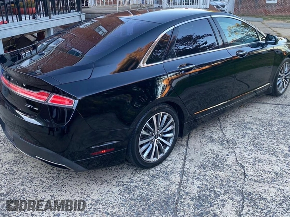 2018 Lincoln MKZ Premiere with VIN 3LN6L5B98JR625687, listed as a Copart auction lot 76837194 with 121,141 mi miles and Clean Title. Bid and sale history available at DreamBid. Image 4.