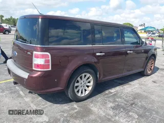 2009 Ford Flex SEL z VIN 2FMDK52C59BA08554, wystawiony jako IAAI lot #42310963 z przebiegiem 165 318 mil mil oraz . Historia ofert i sprzedaży dostępna na DreamBid. Obrazek 4.