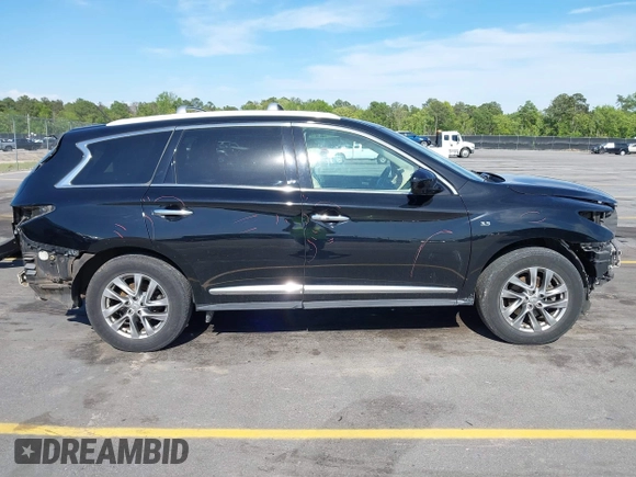 2015 Infiniti QX60 with VIN 5N1AL0MM7FC543874, listed as a IAAI auction lot 42010792 with 163,250 mi miles and . Bid and sale history available at DreamBid. Image 14.