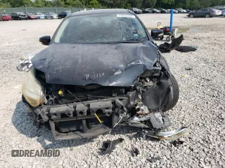 2013 Ford Focus SE z VIN 1FADP3F20DL330366, wystawiony jako Copart lot #59204595 z przebiegiem 163 305 mil mil oraz Szkoda całkowita • Salvage title. Historia ofert i sprzedaży dostępna na DreamBid. Obrazek 5.