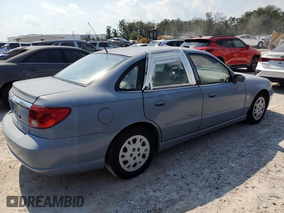 2003 Saturn LS z VIN 1G8JU54F43Y501252, wystawiony jako Copart lot #76197934 z przebiegiem 52 856 mil mil oraz Szkoda całkowita • Salvage title. Historia ofert i sprzedaży dostępna na DreamBid. Obrazek 3.