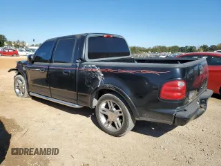 2002 Ford F-150 Harley Davidson with VIN 1FTRW07332KD46296, listed as a Copart auction lot 76333404 with 160,616 mi miles and Salvage Title. Bid and sale history available at carsss.com. Image 2.
