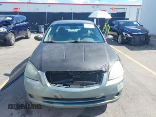2006 Nissan Altima S with VIN 1N4AL11D26N308663, listed as a IAAI auction lot 42187337 with 202,069 mi miles and . Bid and sale history available at DreamBid. Image 12.