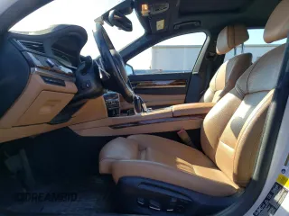 2014 BMW 7 Series 740Li xDrive with VIN WBAYF4C50ED281830, listed as a Copart auction lot 48557035 with 129,497 mi miles and Salvage Title. Bid and sale history available at carsss.com. Image 7.