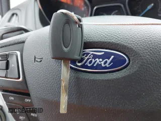 2018 Ford Focus S with VIN 1FADP3E23JL212714, listed as a IAAI auction lot 41895883 with 116,658 mi miles. Bid and sale history available at carsss.com. Image 11.