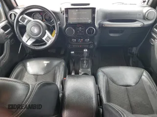 2016 Jeep Wrangler Unlimited Sport z VIN 1C4BJWDG5GL179046, wystawiony jako Copart lot #52989725 z przebiegiem 129 051 mil mil oraz Szkoda całkowita • Salvage title. Historia ofert i sprzedaży dostępna na DreamBid. Obrazek 8.