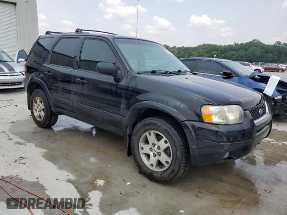 2004 Ford Escape Limited with VIN 1FMCU04164KB51256, listed as a Copart auction lot 58969565 with 137,360 mi miles and Salvage title. Bid and sale history available at DreamBid. Image 4.