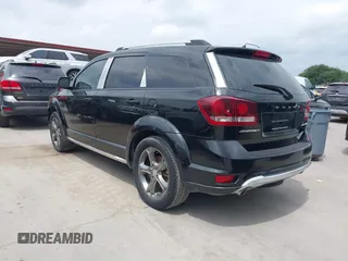 2014 Dodge Journey Crossroad with VIN 3C4PDCGG9ET264920, listed as a IAAI auction lot 42141229 with 127,648 mi miles and . Bid and sale history available at DreamBid. Image 3.