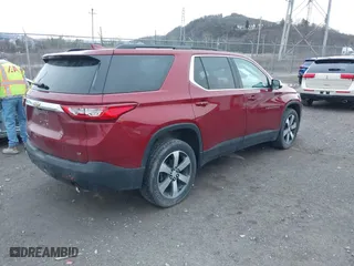 2019 Chevrolet Traverse LT Leather with VIN 1GNEVHKW1KJ164692, listed as a IAAI auction lot 41800874 with 76,866 mi miles. Bid and sale history available at carsss.com. Image 4.