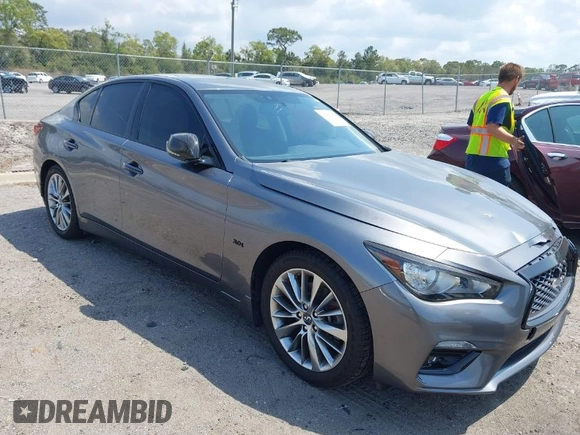 2018 Infiniti Q50 Luxe with VIN JN1EV7AP4JM590048, listed as a IAAI auction lot 41863410 with 55,727 mi miles and . Bid and sale history available at carsss.com. Image 1.
