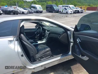 2014 Cadillac CTS Performance with VIN 1G6DG1E35E0107139, listed as a IAAI auction lot 42371034 with 56,988 mi miles and . Bid and sale history available at DreamBid. Image 5.