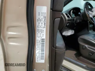 2014 Jeep Grand Cherokee Summit с VIN 1C4RJFJGXEC436797, выставлен на аукционе Copart как лот 60248595 с пробегом 156 395 миль миль и Списание • Salvage title. История ставок и продаж доступна на DreamBid. Изображение 13.