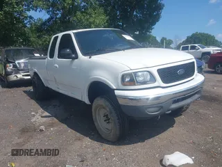 2001 Ford F-150 XL z VIN 1FTRX18L71NB11026, wystawiony jako IAAI lot #42590063 z przebiegiem 218 156 mil mil oraz . Historia ofert i sprzedaży dostępna na DreamBid. Obrazek 1.