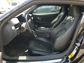 2021 Toyota GR Supra 3.0 with VIN WZ1DB0C04MW035703, listed as a Copart auction lot 61306374 with 46,176 mi miles and Salvage Title. Bid and sale history available at carsss.com. Image 7.